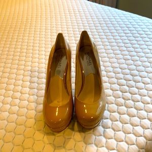Michael Kors never worn patent leather nude pumps